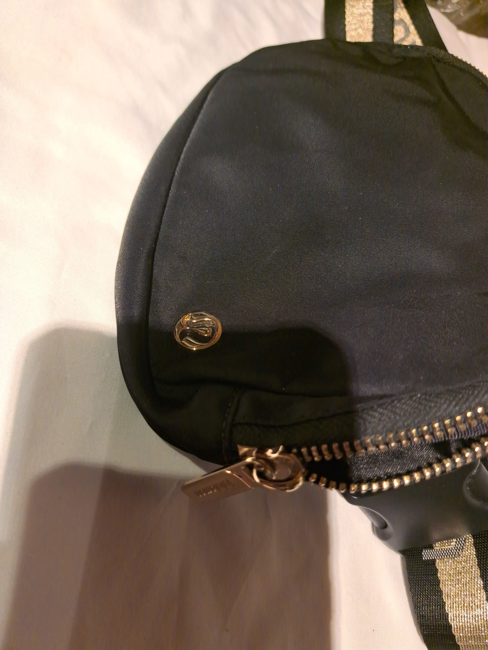 lululemon athletica Black Crossbody Sling Bag with Gold Accents